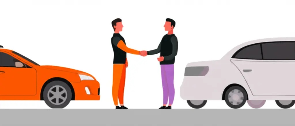 People shaking hands next to their cars