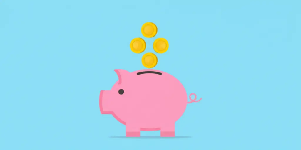 Piggy bank being filled with coins