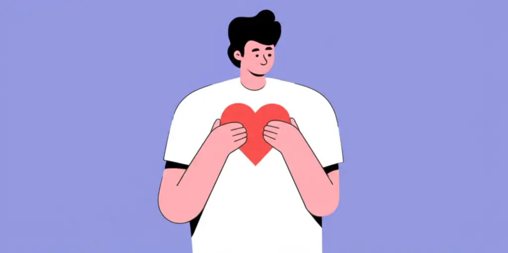 Person holding a heart representing empathy.