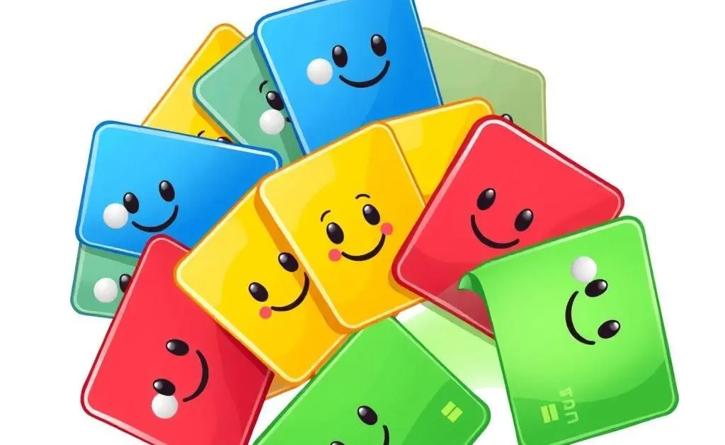 A cartoon-style illustration of different credit cards arranged in a fan, each with a smiley face