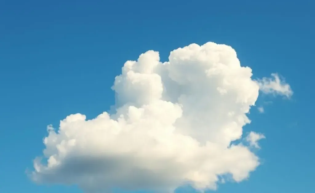 A sky with fluffy clouds forming a question mark.