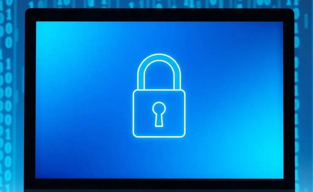 A lock symbol on a laptop screen indicating secure financial data.