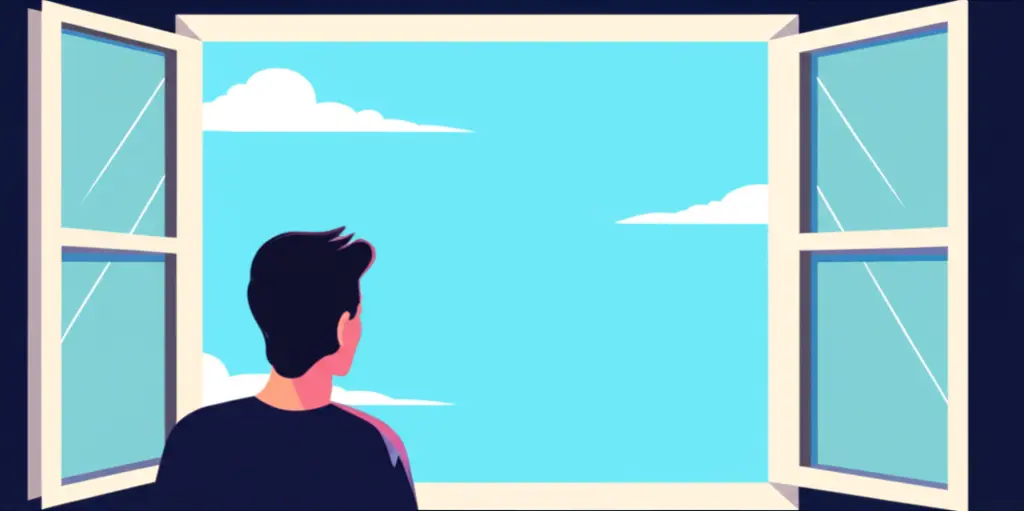 Person looking out a window at a bright sky, symbolizing freedom