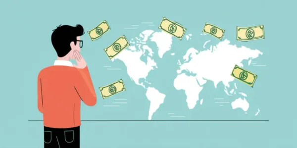 Young adult planning finances with a world map and dollar bills
