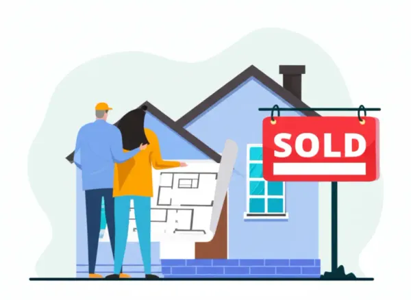 A couple happily looking at a house blueprint with a 'Sold' sign