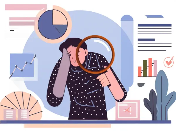 Person examining financial documents with a magnifying glass