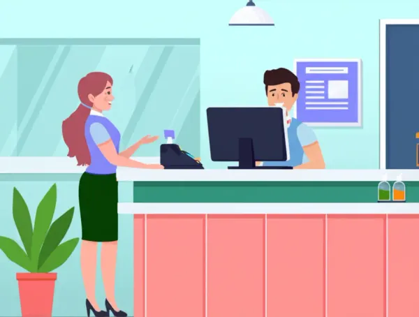 Bank teller assisting a customer with a smile