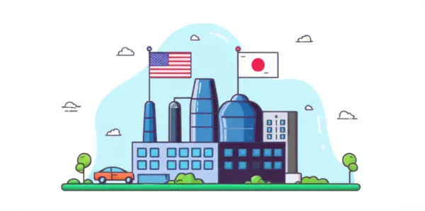 A car factory with an American and a Japanese flag depicting international trade