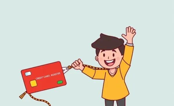 Person cutting credit card rope for debt freedom