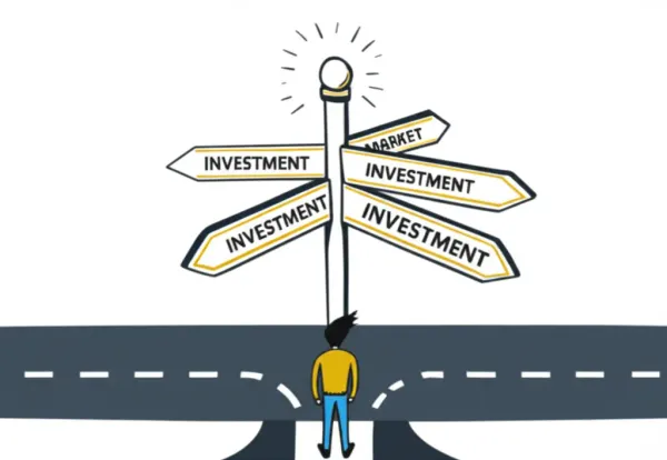 A person at crossroads with investment options road signs