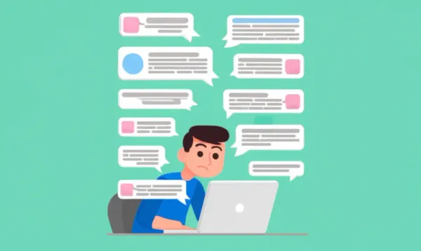 Person overwhelmed by scam emails at their computer