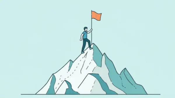Person climbing a mountain symbolizing financial independence