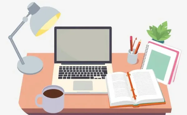 A cozy home office with a laptop, planner, and coffee mug.