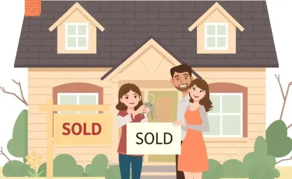 A joyful couple standing in front of their new home with a 'Sold' sign.