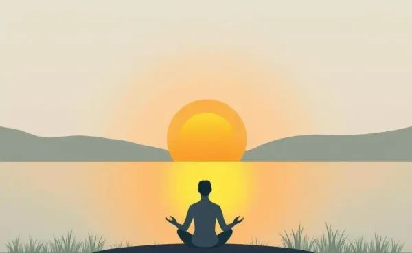 A serene lake with a person meditating at sunrise