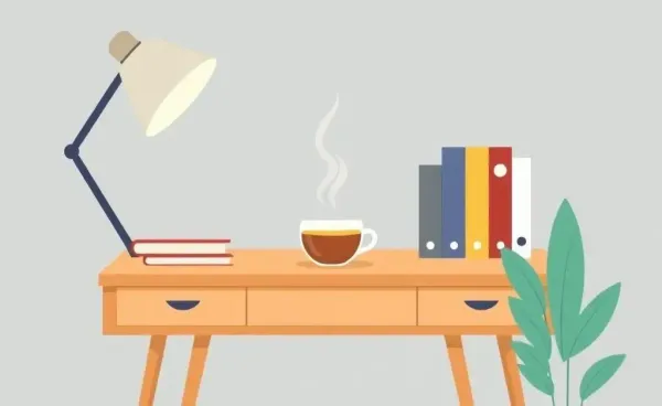 A tidy desk with books and a steaming cup of tea, creating a calm study environment