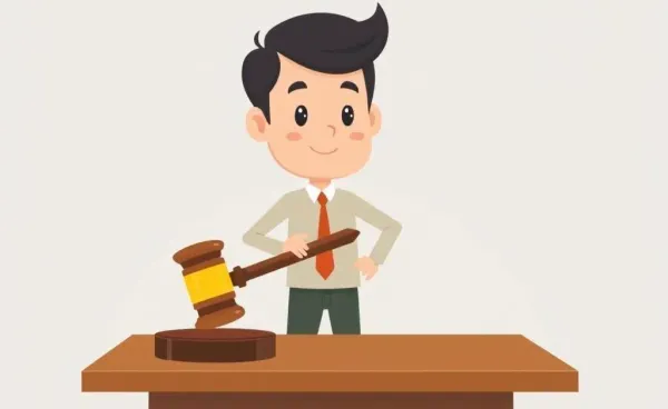 A person standing next to a gavel on a desk